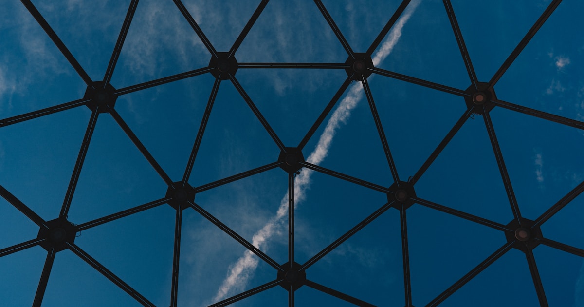 a clear blue sky with some clouds in it