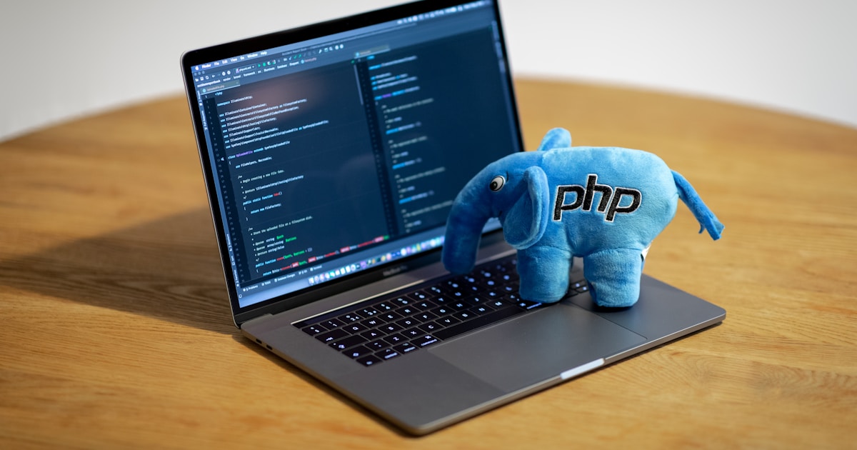 The Role of AI in Software Development: From Coding to Automation 1 blue elephant figurine on macbook pro