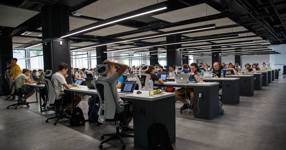 AI Ethics and Risks: Challenges We Must Solve in the AI Era 4 people doing office works