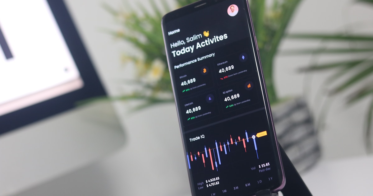 a cell phone displaying a chart on a stand