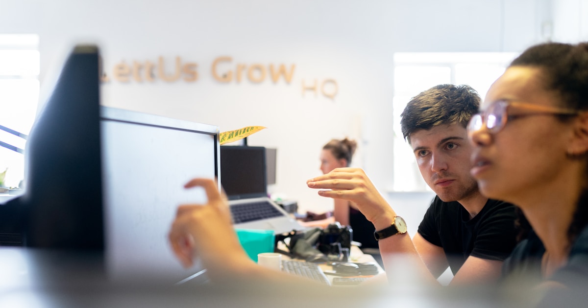 Future of Work with AI: How IT Pros Can Stay Relevant 3 man in black crew neck t-shirt using black laptop computer